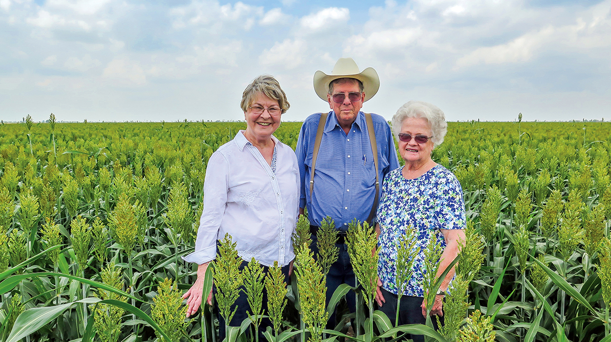 Photo of the Henry family standing in their field