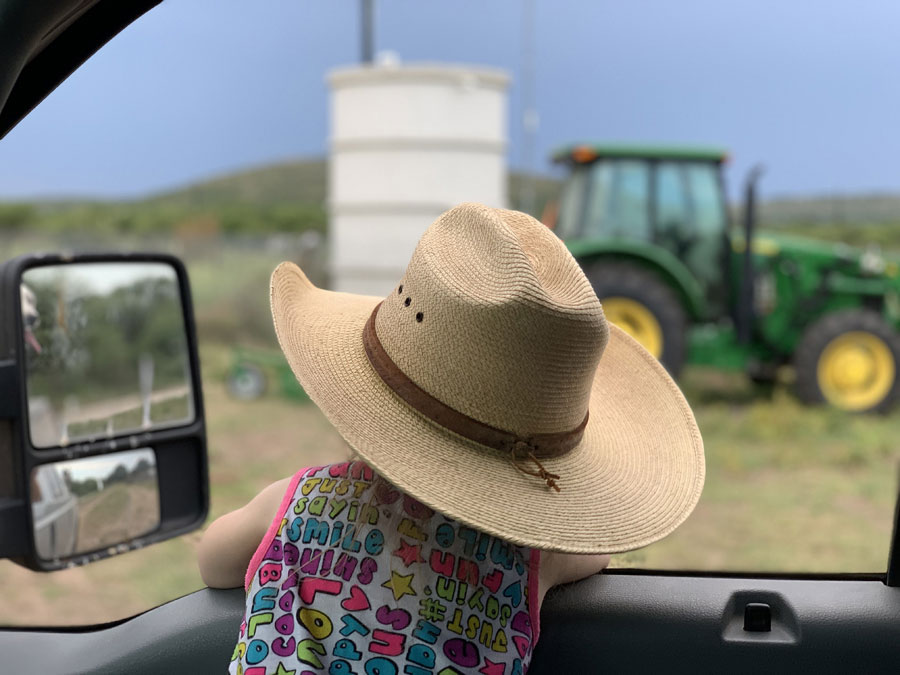 Photo of a child in cowboy hat