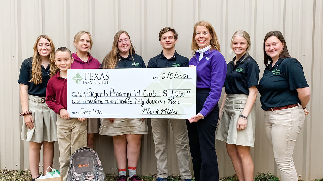 Regents Academy 4-H Club is presented with an award check for Junior Grand Champion of the Texas Farm Credit Youth Ag Video Showcase.